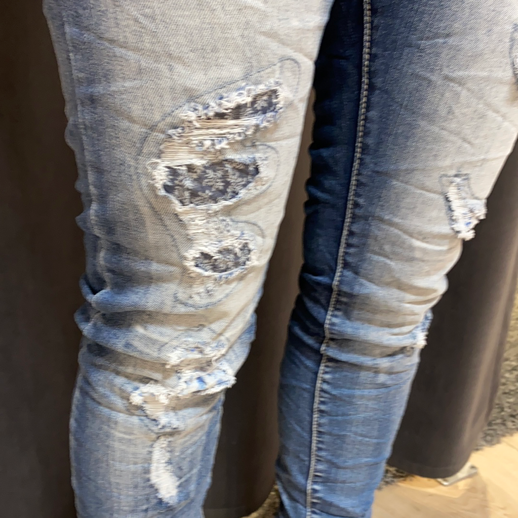 Rullesten ubehagelig Fremsyn Place Du Jour jeans med lapper